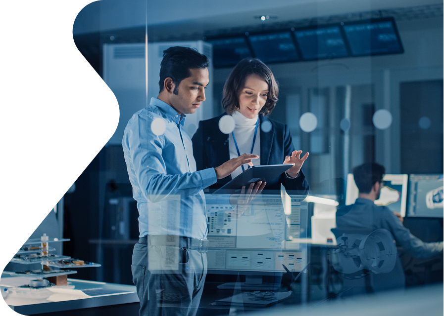 IT professionals collaborating on business technology solutions using digital tools in an office